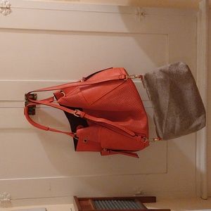 Notld orange bag with woven companion bag